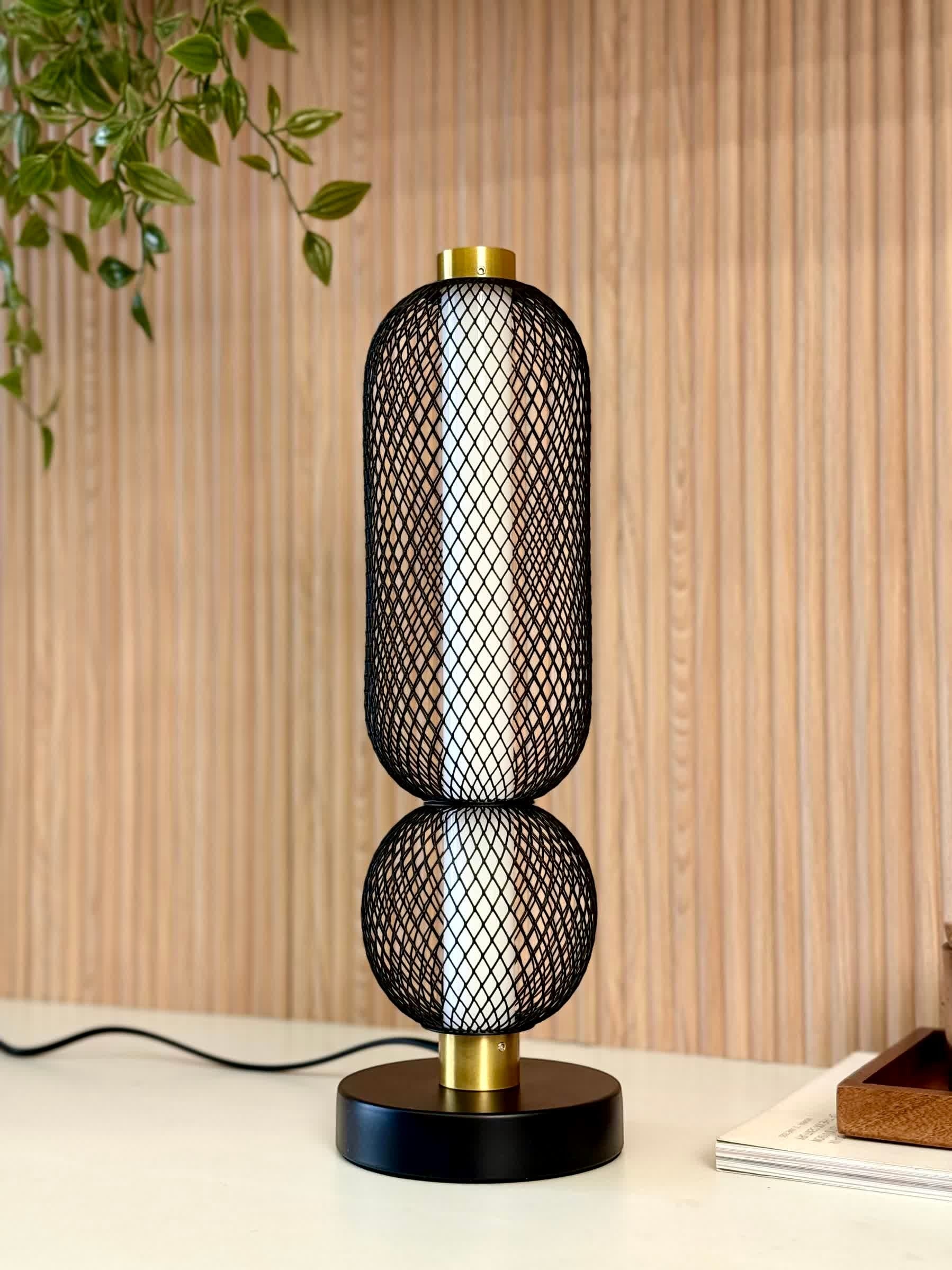High Objects Atlas Mesh Column Table Lamp with black mesh sphere and cylinder shades, brushed gold accents, and black base.