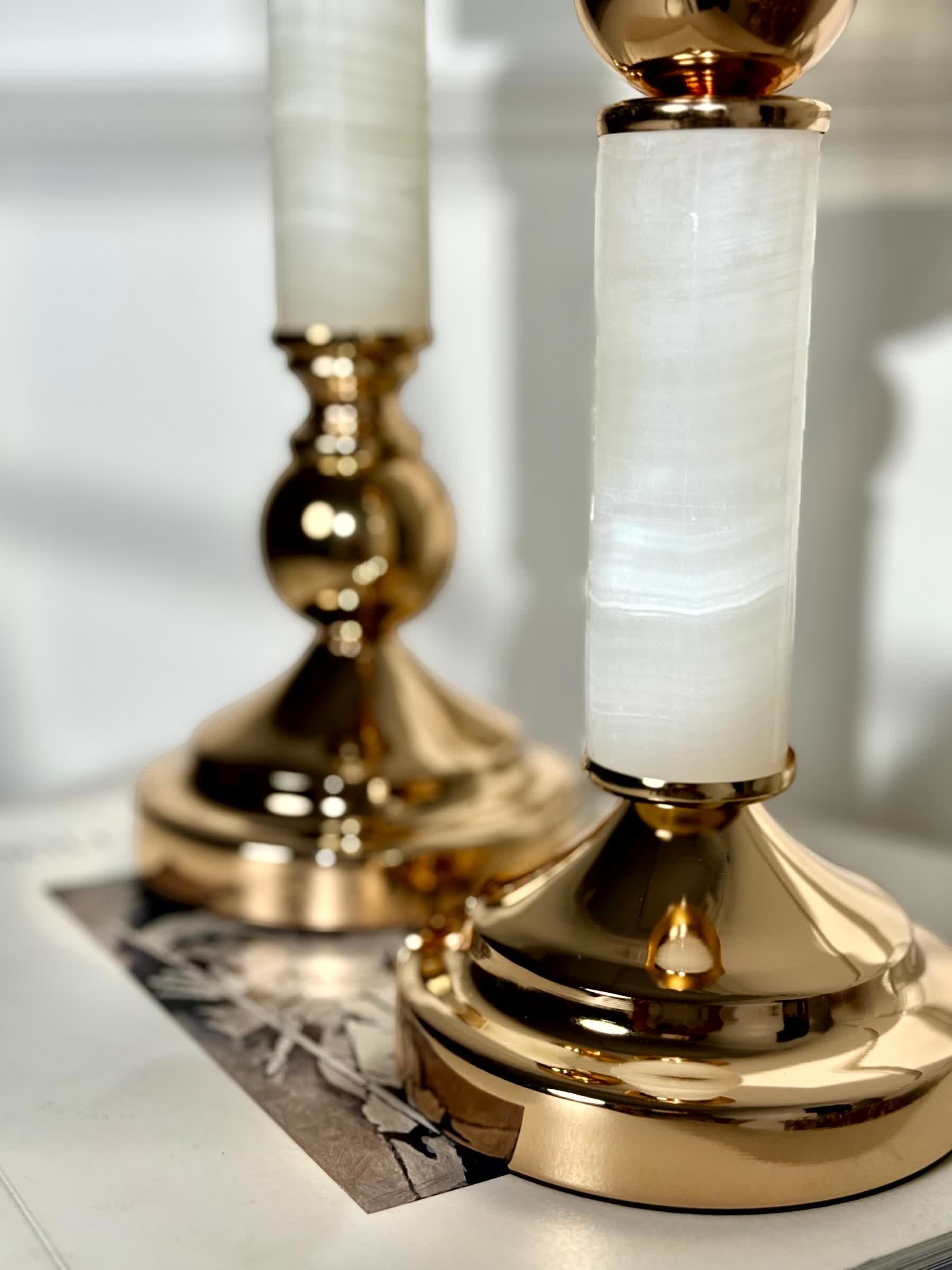 High Objects Aurora Column Candle Stand Set with white stone-inspired columns and gold metallic accents.