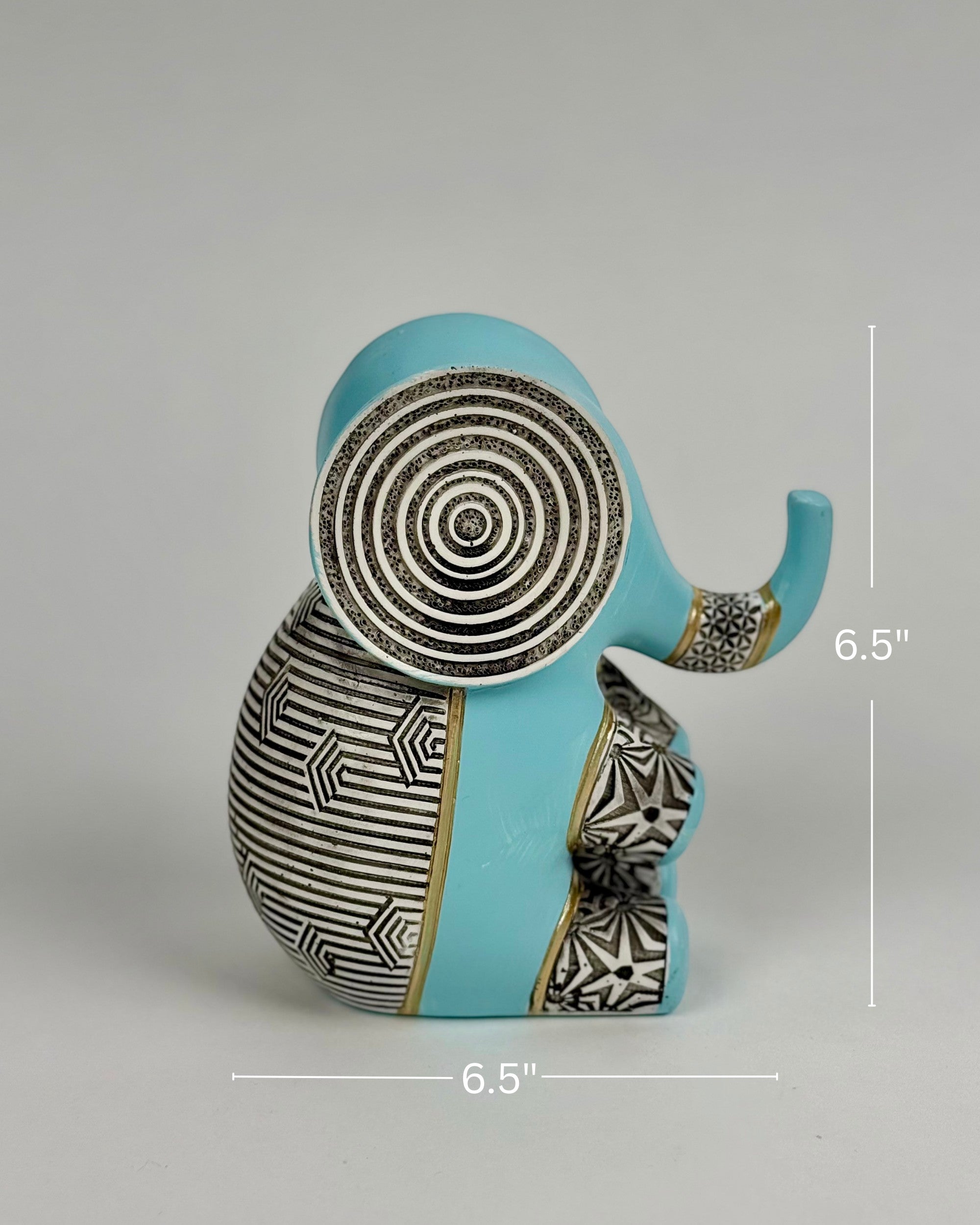 High Objects small blue polyresin elephant figurine with black and white geometric patterns and gold accents.