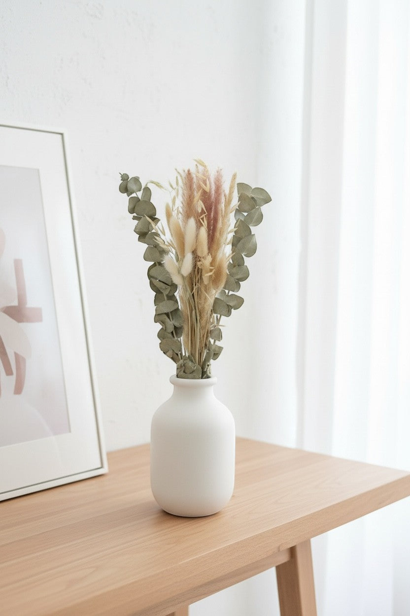 High Objects Botanical Eucalyptus Harvest dried flower arrangement with eucalyptus, pampas grass, bunny tails, and grain stems in a white vase.