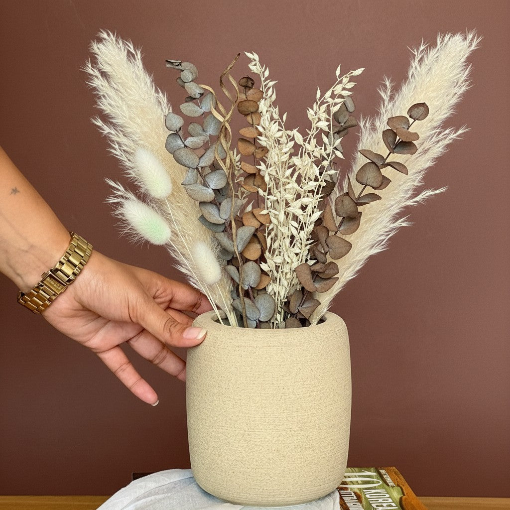 High Objects StoneAura ceramic vase with a textured matte finish, holding dried bunny tail grass.