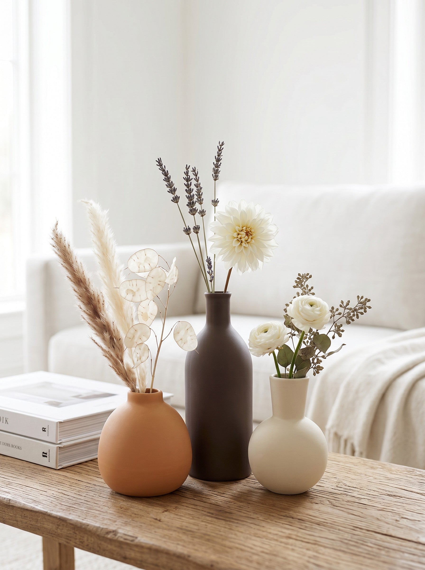 High Objects set of 3 ceramic vases in brown, tan, and cream with minimalist shapes.