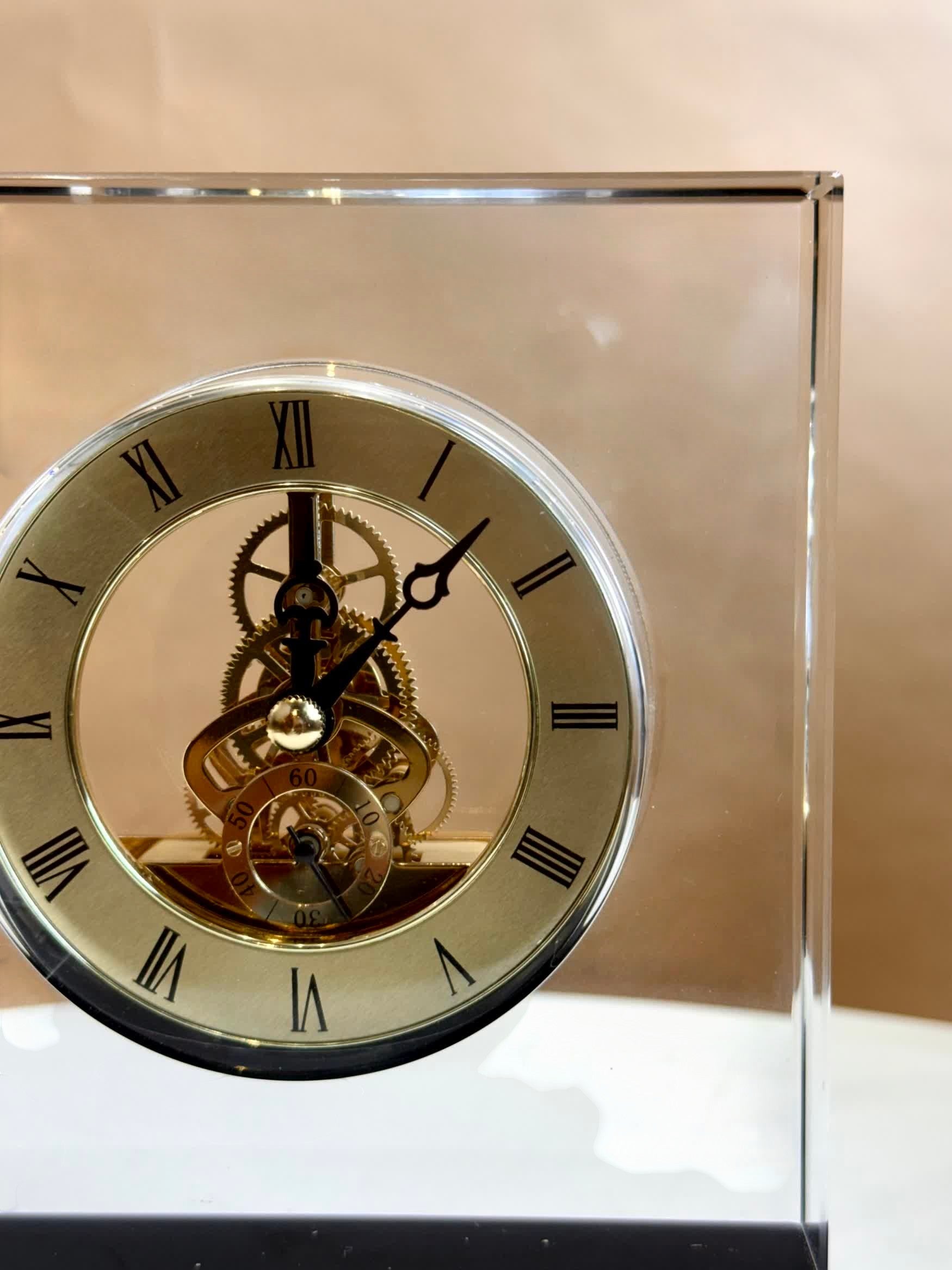 High Objects Crystal Block Gear Desk Clock with gold-tone exposed gears and Roman numerals on a black base.