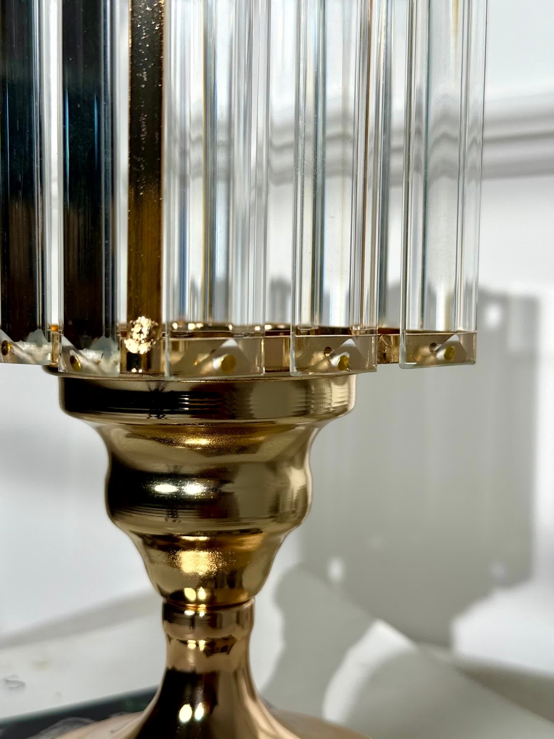 High Objects Crystal Luxe candle stand set with gold pedestal base and fluted glass hurricane top. Reflects light beautifully.