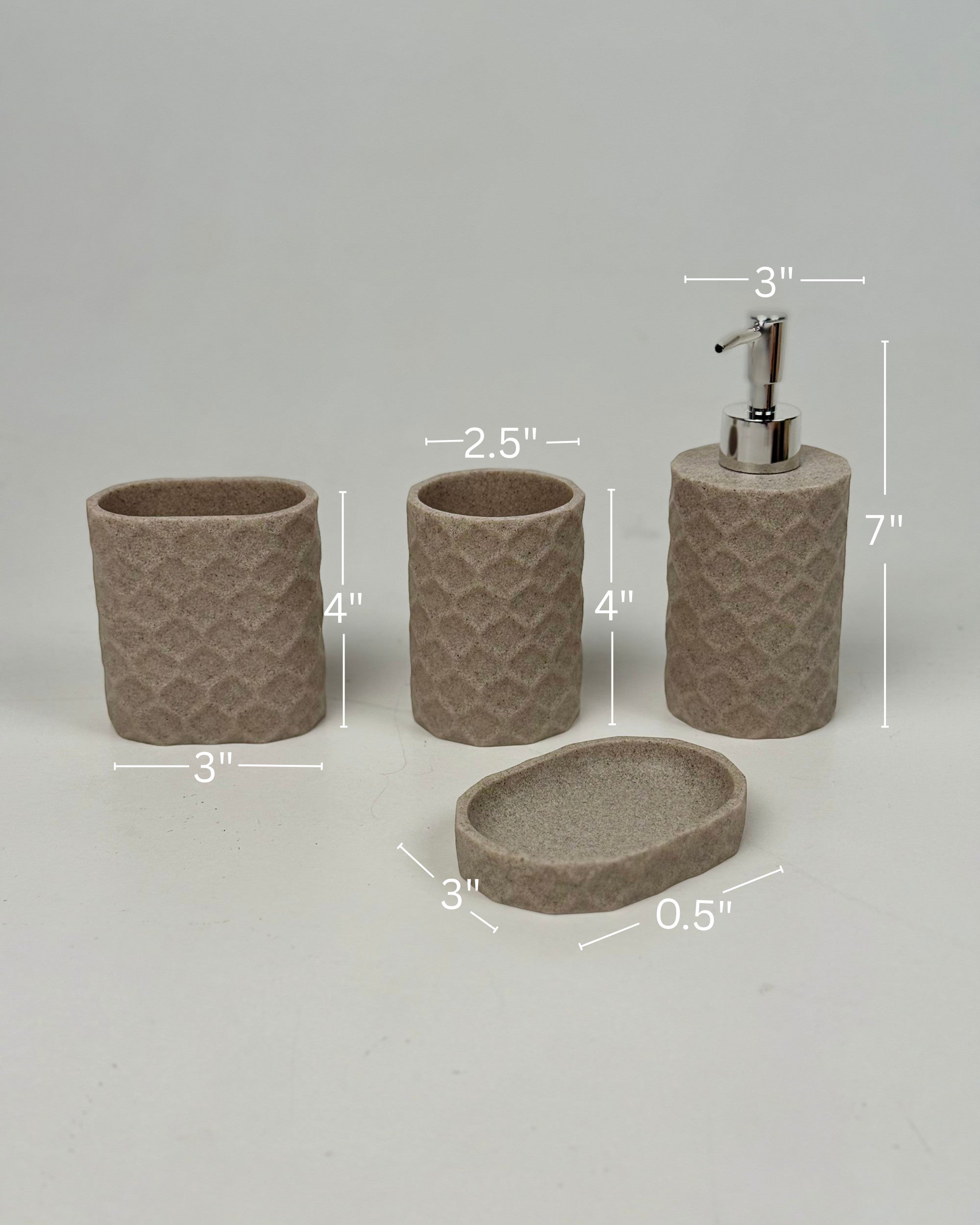 High Objects Dunecraft Bathroom Accessory Set in taupe textured resin, includes soap dispenser, toothbrush holder, cup, and soap dish.