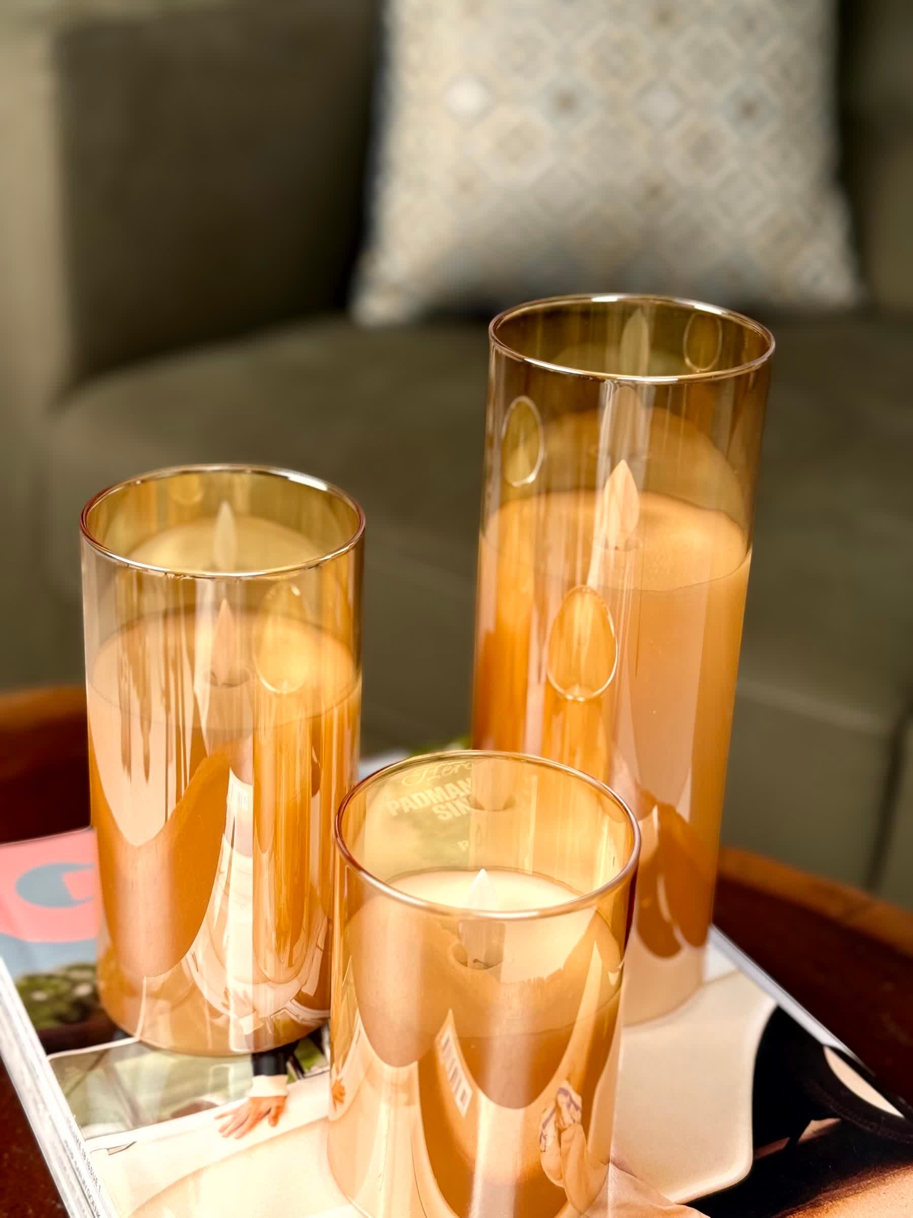 High Objects Lumiglass LED candles in amber glass cylinders, set of 3, flickering LED flames.