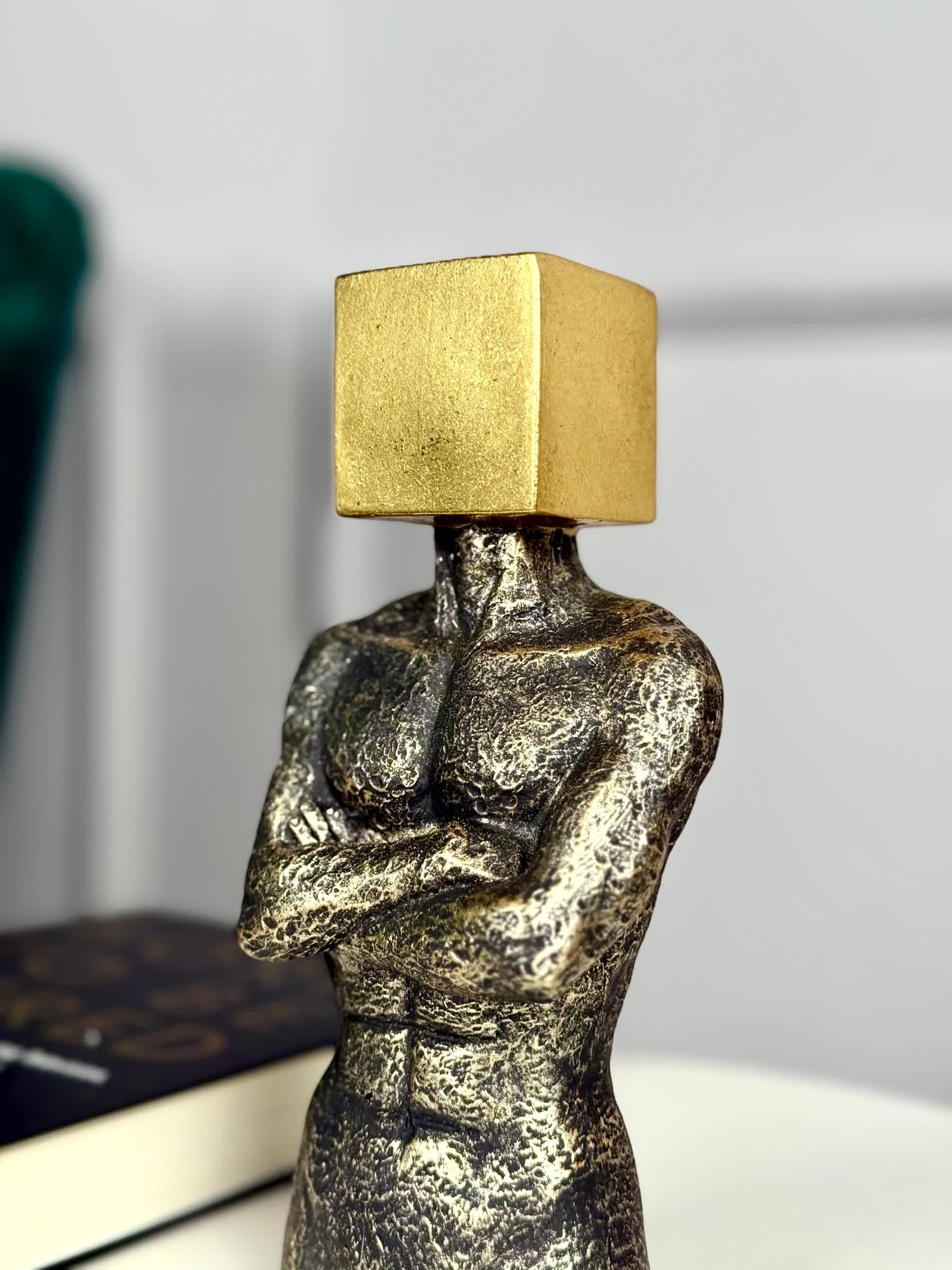 High Objects Mind in Form Showpiece sculpture, textured polyresin torso with crossed arms, gold cube head. Modern decor.