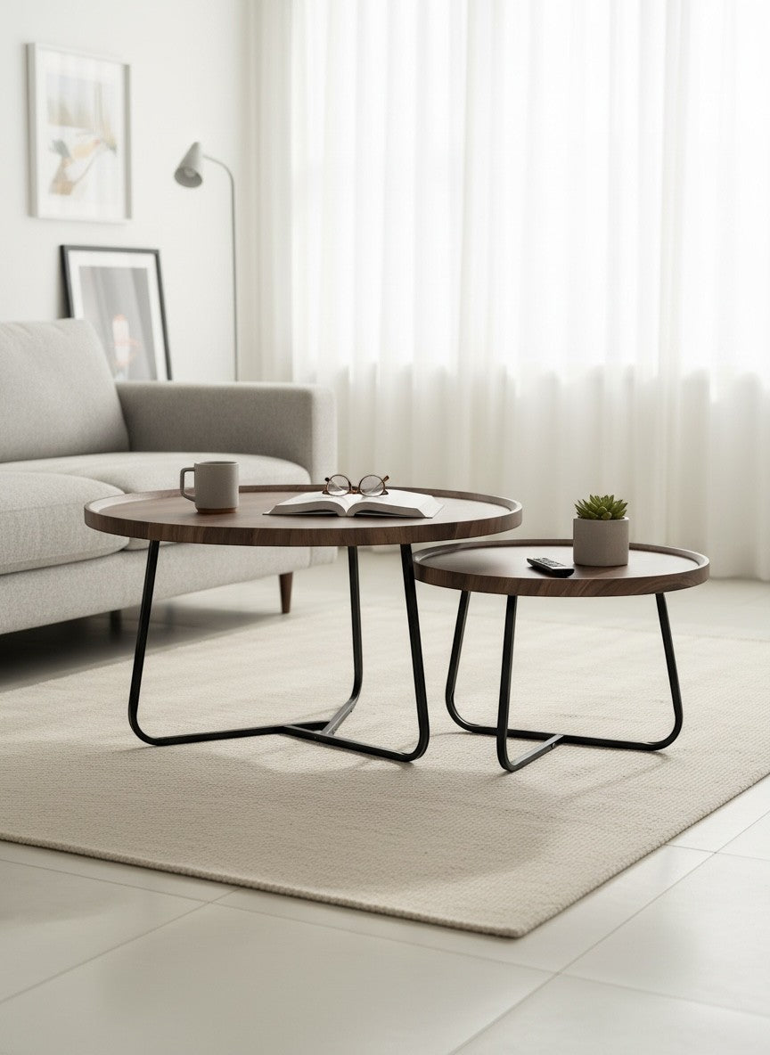 High Objects modern round nesting coffee table set with wooden tops and black metal legs. Includes two sizes for flexible arrangement.