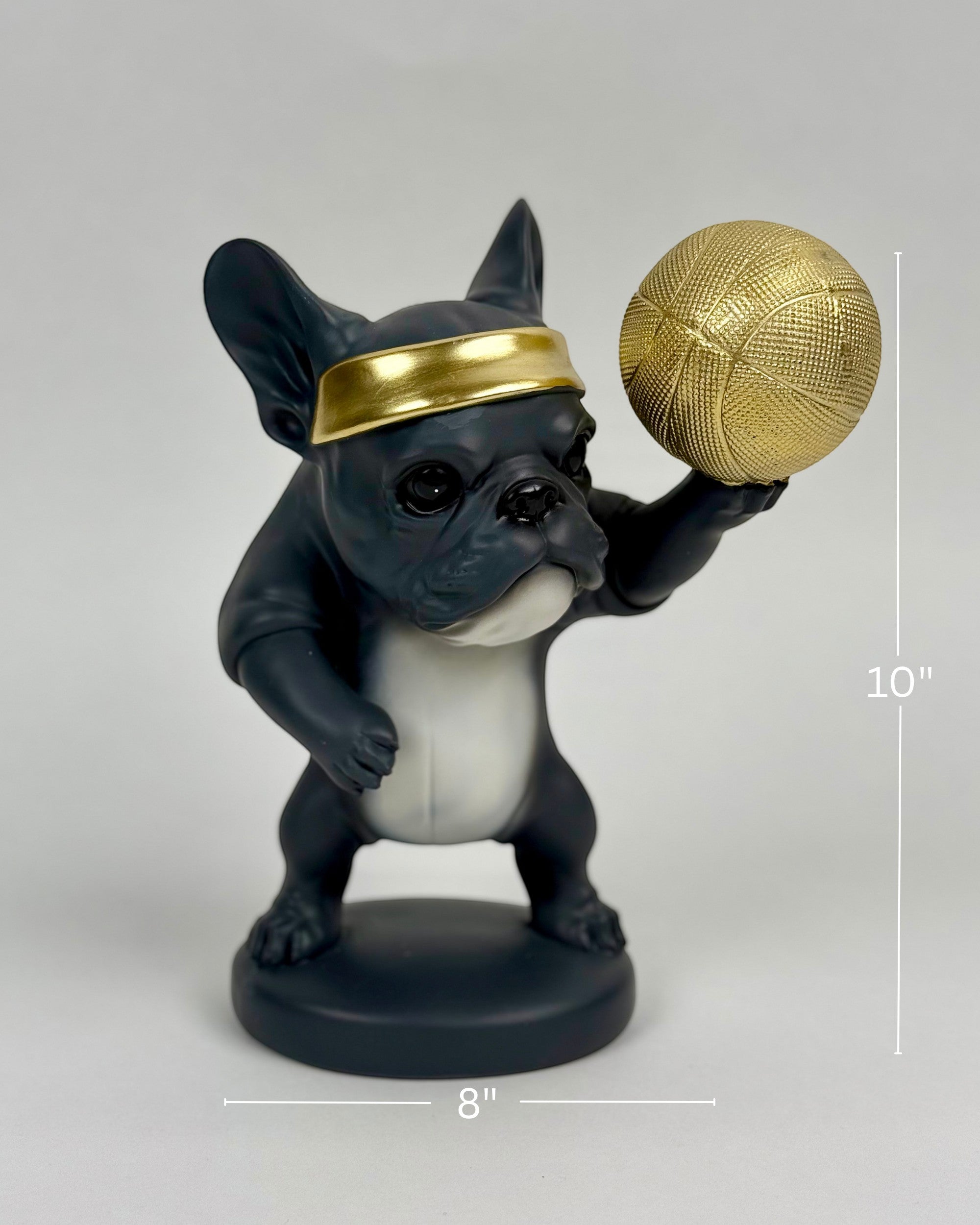 High Objects Sport Bulldog showpiece in matte black and grey, wearing a gold headband and holding a gold basketball.