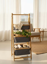 High Objects 3-tier bamboo storage organizer rack with dark grey fabric baskets holding books, plants, and towels.