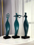 High Objects Abstract Musician Showpiece Set: textured teal polyresin figures of a dancer, violinist, and flutist on black bases.
