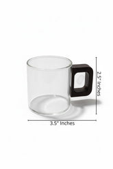 High Objects Aether Arc glass cup with dark square handle. Clear borosilicate glass, 3.5" W x 2.5" H.