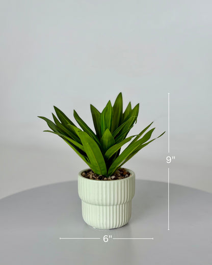 High Objects Artificial Dracaena Lemon Lime Plant with striped green leaves in a white ribbed ceramic pot with pebbles.