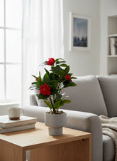 High Objects artificial scarlet camellia plant with red blooms and green leaves in a grey pot, 15" tall.