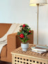 High Objects Artificial Scarlet Camellia Plant with red blooms and green leaves in a white pot.