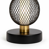 High Objects Atlas Mesh Column Table Lamp with stacked black mesh sphere and cylinder shades, brushed gold accents, and black base.