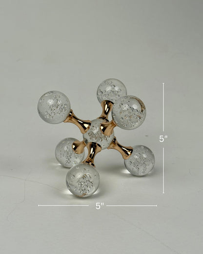 High Objects Aurora Orb Sculpture Artefact with clear glass spheres filled with bubbles and gold metallic rods.