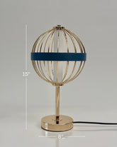 High Objects Azure Aurette Cage Table Lamp with gold wire globe, blue leather accent band, and gold stem on a white background.