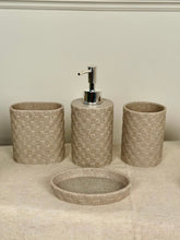 High Objects Weaveform Bathroom Accessory Set in beige with woven texture. Includes soap dispenser, toothbrush holder, cup, and soap dish.