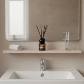 High Objects Blossom Reed Aroma Diffuser with fresh flowers scent in a glass bottle with natural reeds.