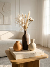High Objects set of 3 ceramic vases in brown, beige, and tan. Round and bottle shapes.