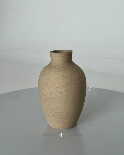 High Objects ClayHaven Vase, 7-inch tall beige textured ceramic vase with a matte finish and rounded form.