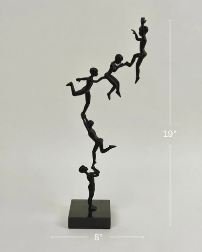 High Objects Climber Crew Artefact sculpture, matte black finish, 19 inches tall, depicting figures in a chain lifting each other.
