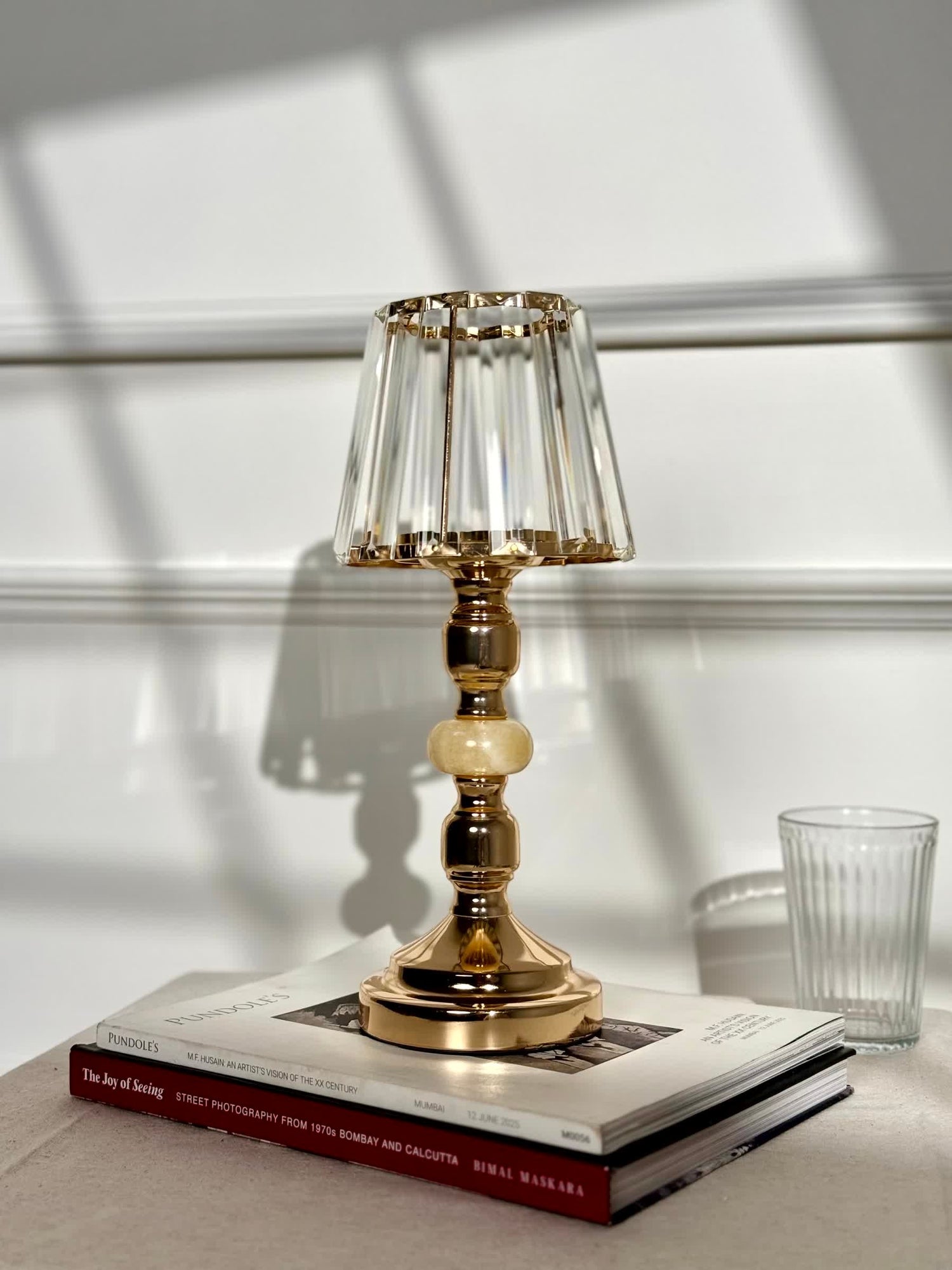 High Objects Crystal Belle candle stand with faceted glass shade and gold pedestal stem with bead details.