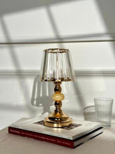 High Objects Crystal Belle candle stand with faceted glass shade and gold pedestal stem with bead details.