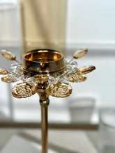 High Objects Crystal Bloom Candle Stand Set with amber glass hurricane and crystal petals. Gold metal.