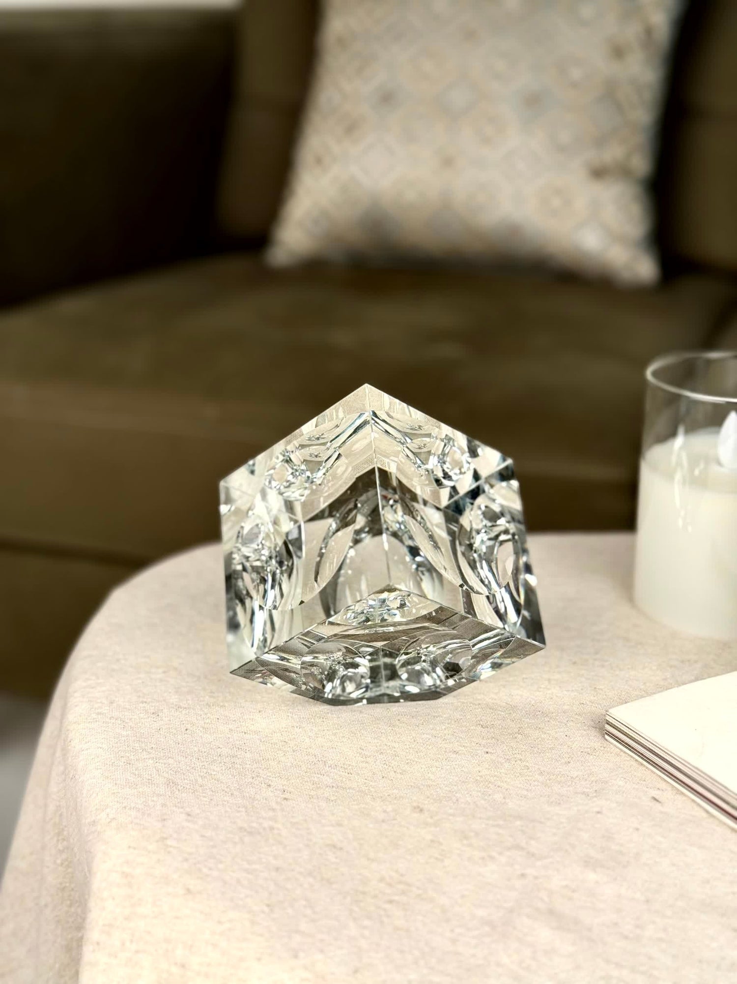High Objects clear crystal cube artefact with sharp, polished edges, reflecting light beautifully. Modern sculptural décor.