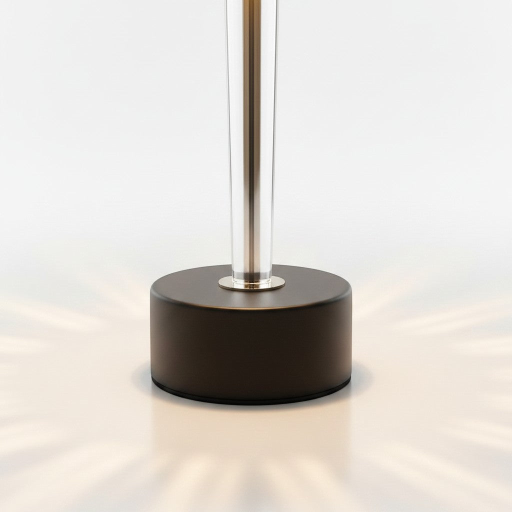 High Objects Crystal Halo Table Lamp with gold stem, black shade, and crystal accents, casting warm light.