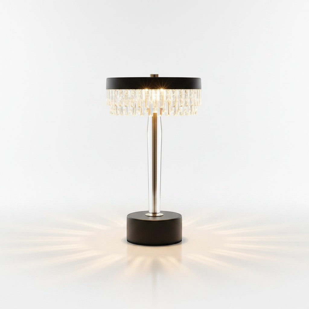 High Objects Crystal Halo Table Lamp with gold stem, black base, and crystal fringe shade casting warm light.