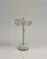 High Objects Crystal Halo Table Lamp with faceted crystal accents and a clear stem on a white base.
