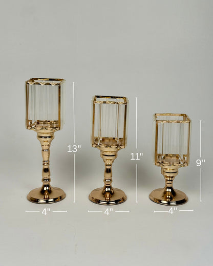 High Objects Crystal Luxe candle stand set with faceted glass hurricanes and gold pedestal bases. Set of 3 sizes: 13", 11", 9".