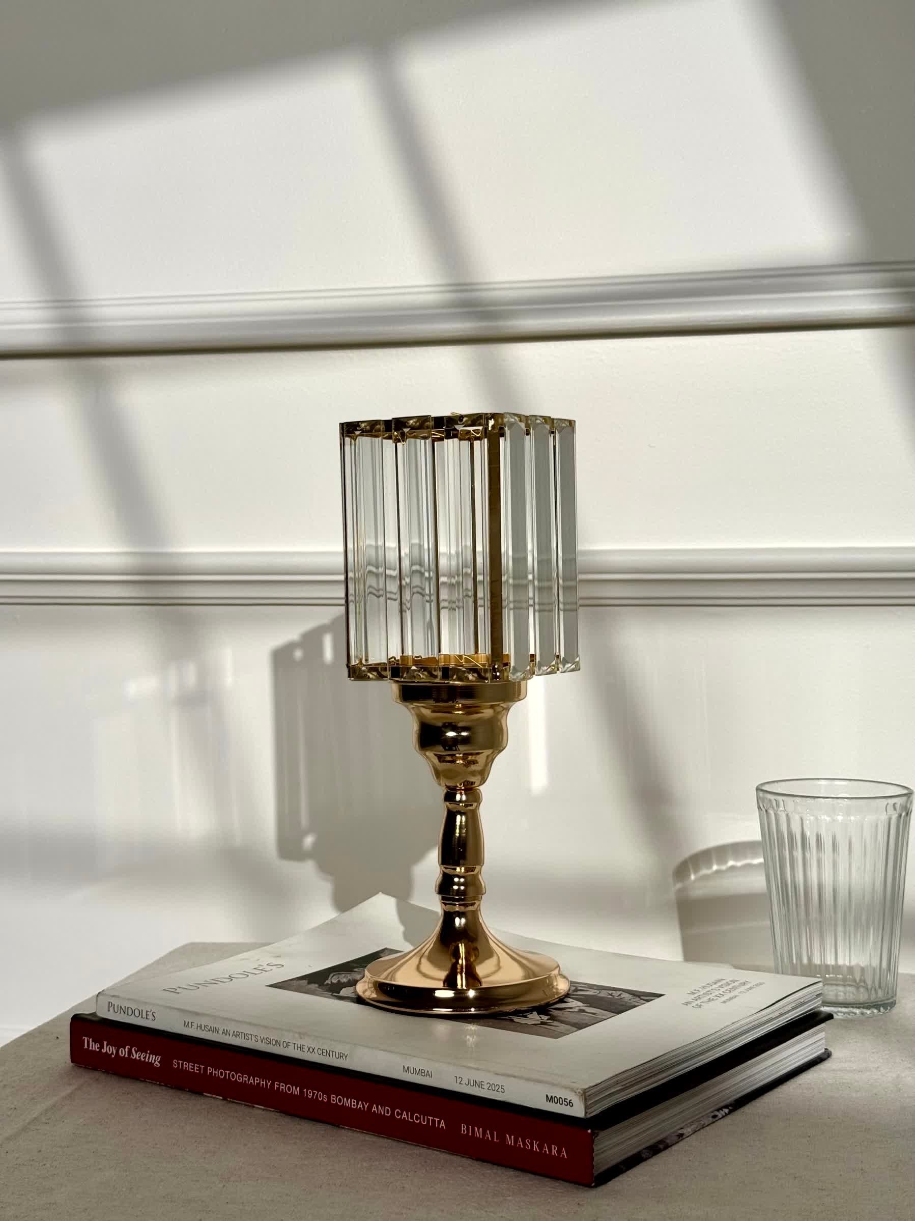 High Objects Crystal Luxe candle stand set with faceted glass hurricane top and gold pedestal base.