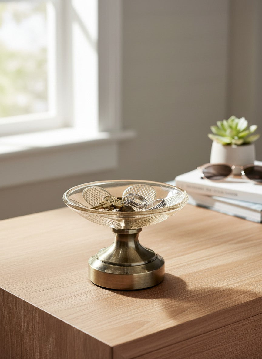 High Objects Crystal Petal Accent Platter, clear glass with embossed pattern on a metallic pedestal base.