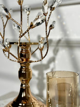 High Objects gold metal candle stand with crystal leaves and amber glass hurricane
