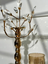 High Objects gold metal candle stand with crystal leaves and amber glass hurricane