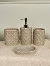 High Objects Dunecraft Bathroom Accessory Set in beige stone texture with geometric pattern. Includes soap dispenser, toothbrush holder, cup, and soap dish.