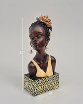 High Objects Elysian Grace Woman Showpiece bust with braided hair, flower, pearl earrings, and patterned base.