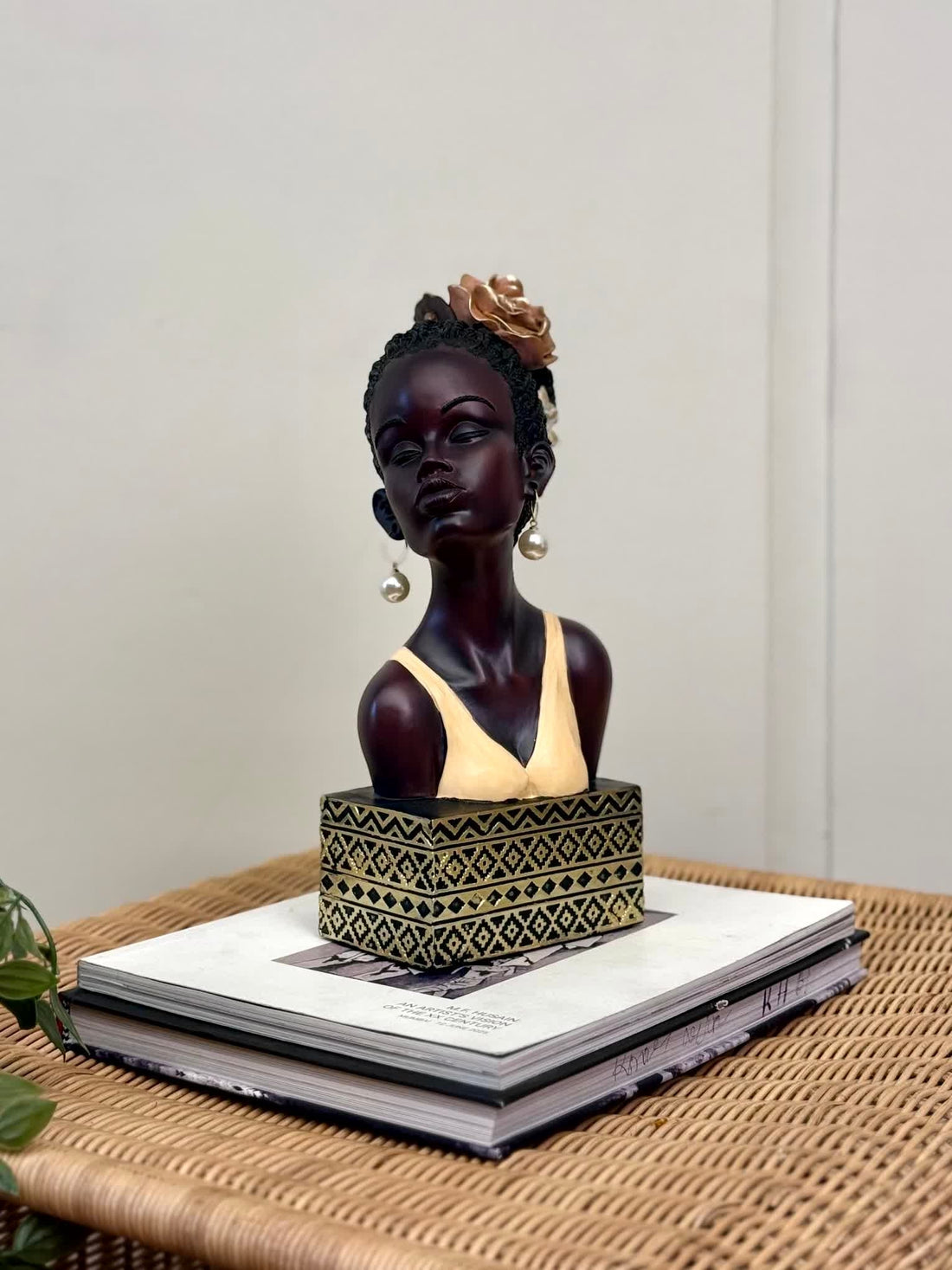 High Objects Elysian Grace Woman Showpiece bust with braided hair, flower, pearl earrings, and patterned base.