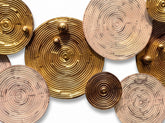 High Objects wall art featuring metallic gold and blush pink circular discs with concentric ring textures and spheres