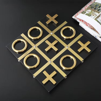 High Objects Gold Tic-Tac-Toe Table Décor Set with gold iron pieces and black MDF base. Modern luxury accent.