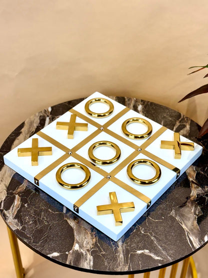 High Objects Gold Tic-Tac-Toe Set with white base and gold-tone iron pieces. Modern luxury décor for tables and desks.