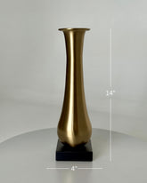 High Objects Eterna Gold Vase, 14-inch tall brushed gold metallic vase with a flared opening on a black square base.