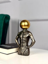 High Objects Golden Mind Showpiece, a textured black polyresin sculpture of a muscular torso with a gleaming gold orb head.