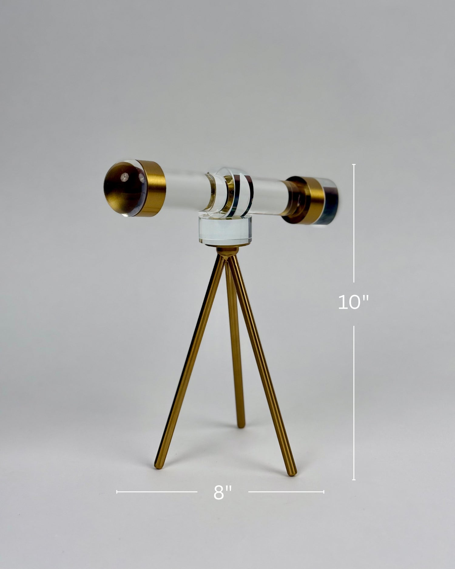 High Objects Golden Navigator Artefact, a 10-inch tall acrylic telescope replica with gold accents on a tripod base.