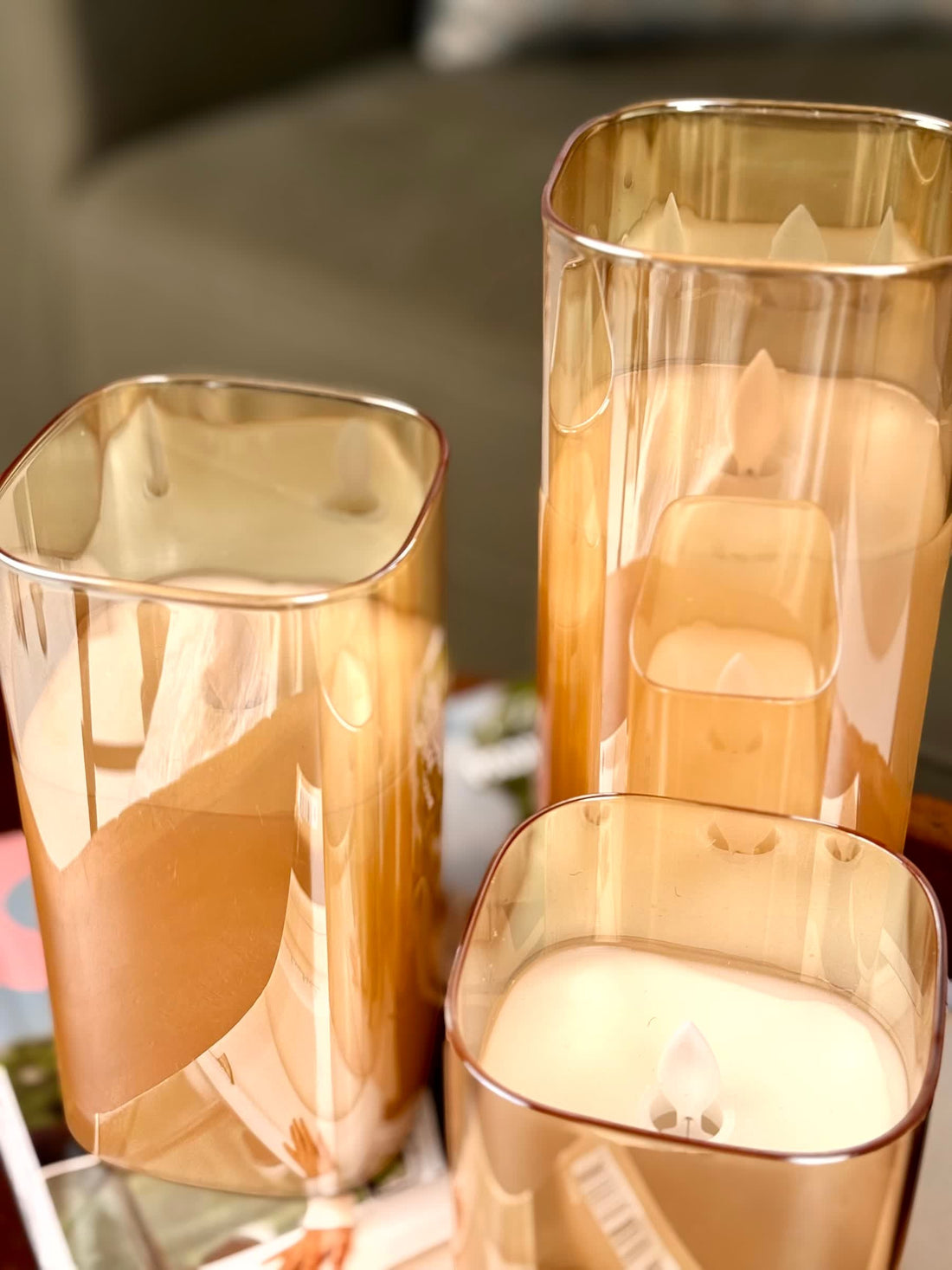 High Objects Halomist LED Candle Collection in amber glass, featuring flickering LED flames and modern geometric shapes.