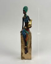 High Objects Heritage Grace tribal woman showpiece, 16-inch polyresin sculpture with hand-painted attire and gold pot.